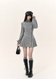 Women's grey tailored double-button dress with fitted waist and long sleeves