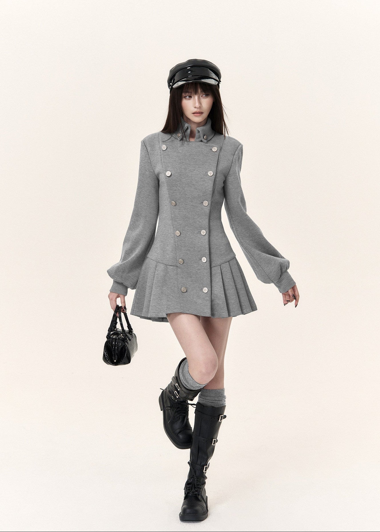 Grey double-breasted pleated mini dress with military-inspired stand collar