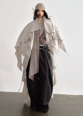 JNYLON detachable cape trench coat women, Korean stylish linen trench coat, modern Korean fashion long coat, chic natural style outerwear women, trendy Korean street chic trench, plaster white irregular trench coat, oversized linen blend coat Korean style, urban fashion layered trench women, stylish Korean aesthetic long coat, fashionable natural tone trench coat