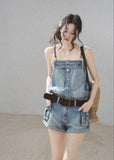 Casual cargo denim romper styled with a belt