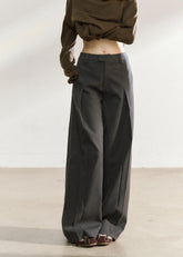 Dark gray relaxed wide-leg trousers with a tailored waistband
