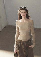 Sheer lace long sleeve top in ivory