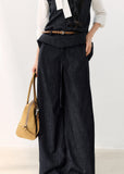 Dark indigo pleated wide-leg trousers with a foldover waist