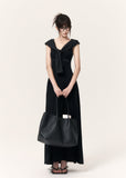 Black cross-print knit maxi dress with cropped pinstriped shrug