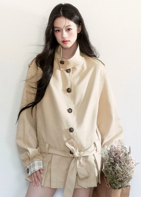 Fragileheart trench coat, short belted coat, luxury Korean fashion, beige autumn jacket, quiet luxury outerwear, pastel noir aesthetic, early fall outfit, elegant short trench, K-fashion 2025, minimalist feminine coat, tie-up waist jacket, sophisticated Korean fashion, modern beige outerwear, chic autumn coat