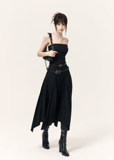 Black strapless midi dress with an asymmetric pleated skirt and wide PU belt