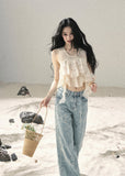 Ivory layered ruffle sleeveless top with cascading chiffon details