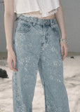 Light blue floral wide-leg jeans with sparkling embellishments
