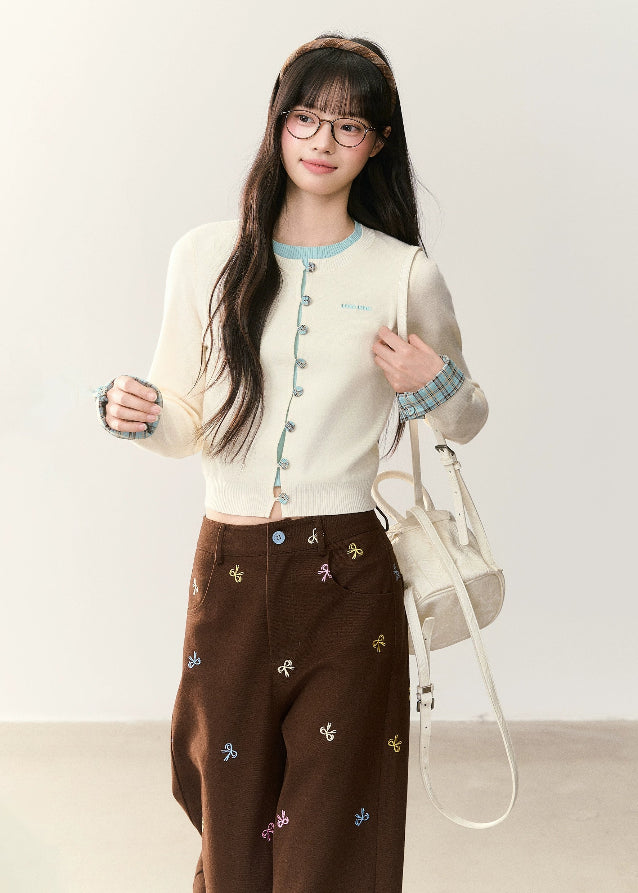 umoumo knit top, fake two piece knitwear, Korean style knit top, plaid patchwork knit sweater, contrast collar knit top, cute Korean knitwear, feminine knit top 2025, layered look sweater, preppy style knit top, soft girl fashion top, kawaii knit cardigan, Korean casual knitwear, girls contrast knit pullover