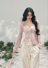 AOMALM floral knit cardigan, French romantic spring sweater, three dimensional flower cardigan, feminine V-neck knitwear women, Korean elegant spring knit, quiet luxury romantic cardigan, delicate floral neckline sweater, Parisian inspired womens knitwear, soft feminine layered cardigan, blush pink romantic knit top, refined Korean French aesthetic clothing, luxury spring cardigan women, poetic feminine knitwear, lightweight floral sweater women, elegant romantic fashion cardigan, soft luxury womenswear kni