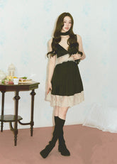 Black lace-trim slip dress with tie shoulder straps