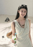Women’s sleeveless sage mini dress with a layered neckline