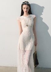 Ivory floral lace midi dress with a fitted waist
