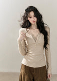 Romantic faux layered V-neck top with decorative front buttons