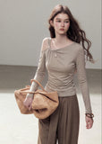 Fitted autumn commuter top with off-shoulder design