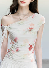 fragileheart set, floral mesh top, cross shoulder top, korean feminine set, summer flower outfit, printed mesh top, mini skirt set, soft girl summer outfit, korean summer fashion, floral two piece set, feminine vacation outfit, romantic mesh top