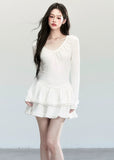 Fragileheart knit dress, ballet style outfit, ivory ruffle one-piece, luxury Korean fashion, quiet luxury womenswear, pastel noir aesthetic, elegant autumn dress, V-neck knit outfit, pre-autumn K-fashion, romantic feminine style, tiered ruffle skirt, soft Korean fashion, delicate white dress, graceful knit one-piece