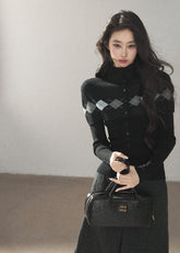 Black argyle shawl layered wool blend cardigan with diamond pattern