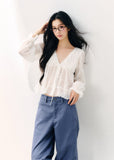 Pale yellow V-neck blouse with double-layer ruffles