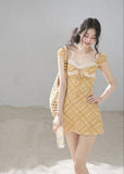 Women’s fitted plaid mini dress with petite puff sleeves