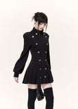 Black Napoleon-style mini dress with metallic buttons and flared pleated skirt
