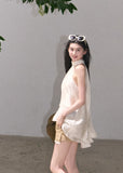 Light acetate halter camisole top with a relaxed fit