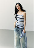 Pale blue cropped bolero with a navy and white striped camisole