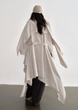 JNYLON detachable cape trench coat women, Korean stylish linen trench coat, modern Korean fashion long coat, chic natural style outerwear women, trendy Korean street chic trench, plaster white irregular trench coat, oversized linen blend coat Korean style, urban fashion layered trench women, stylish Korean aesthetic long coat, fashionable natural tone trench coat