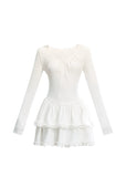 Fragileheart knit dress, ballet style outfit, ivory ruffle one-piece, luxury Korean fashion, quiet luxury womenswear, pastel noir aesthetic, elegant autumn dress, V-neck knit outfit, pre-autumn K-fashion, romantic feminine style, tiered ruffle skirt, soft Korean fashion, delicate white dress, graceful knit one-piece