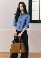 Dark indigo wide-leg jeans with contrasting diagonal front lines