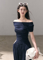 Deep navy off-shoulder top and wide-leg pants set