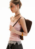 Y2K two-piece top set styled with wide-leg pants