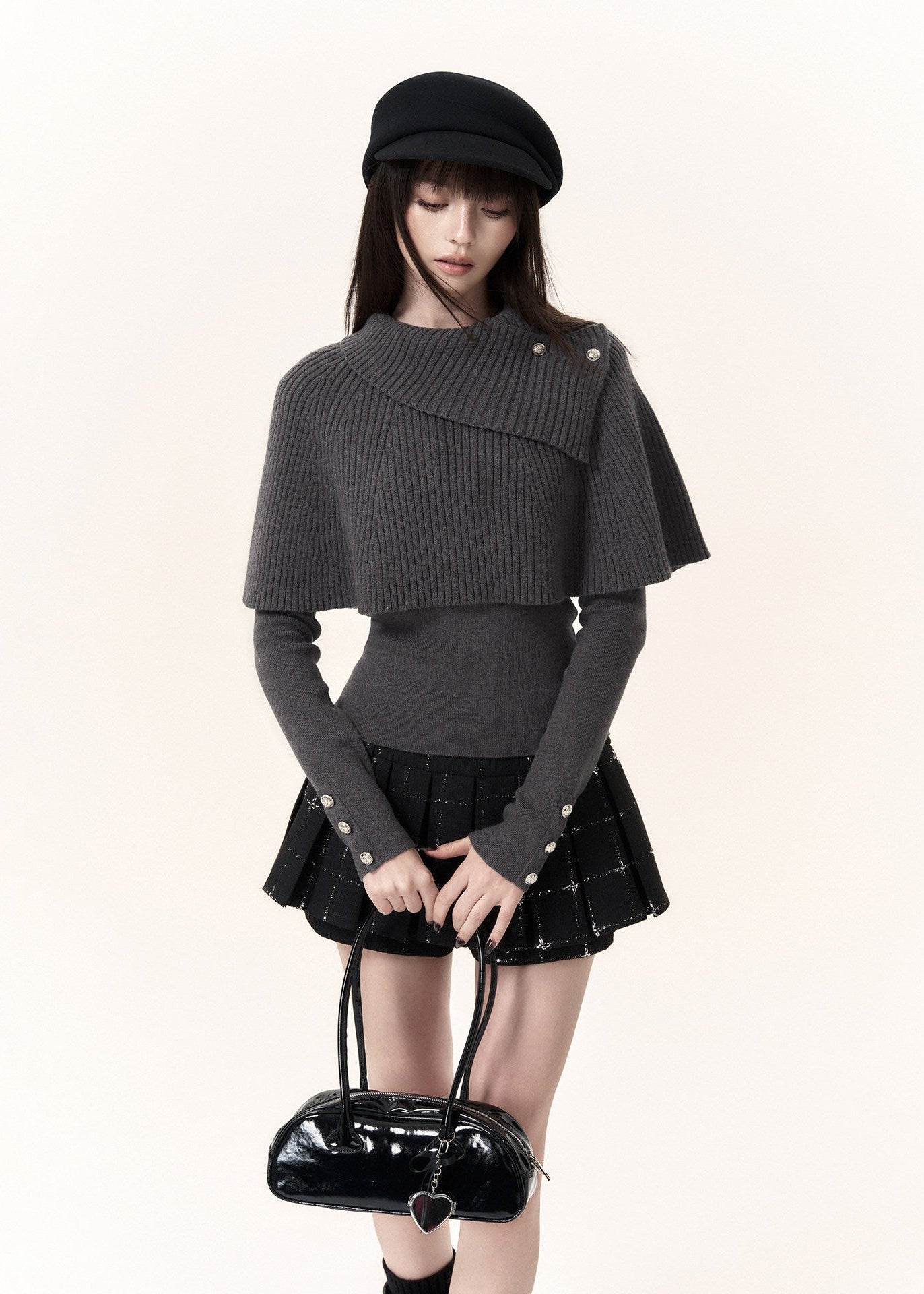 Dark grey ribbed cape overlay top with fitted long sleeves