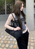 Blue-gray striped polo top with a buttoned collar and fitted sleeveless silhouette