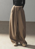 Taupe wide-leg pants with relaxed autumn styling