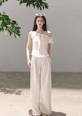 Ivory draped top and wide-leg pants set