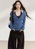 Blue asymmetric knit top with a wide foldover neckline
