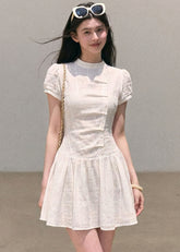White puff-sleeve mini dress with fitted waist