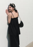 Women’s loose fit sleeveless summer top with adjustable shoulder ties