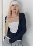 Sky-blue long-sleeve knit top with a twisted wrap front