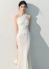 Minimal asymmetric top styled with relaxed wide-leg denim