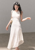 Pearl white sleeveless dress with soft pleated texture