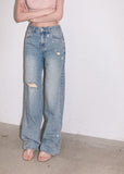 Distressed straight-leg denim pants with starry sparkle