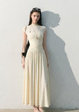 Elegant cream maxi dress with cinched waist detail