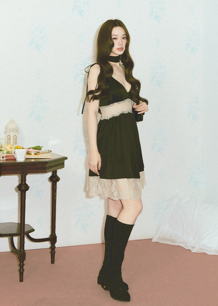 Feminine satin-style black dress with vintage lace detail