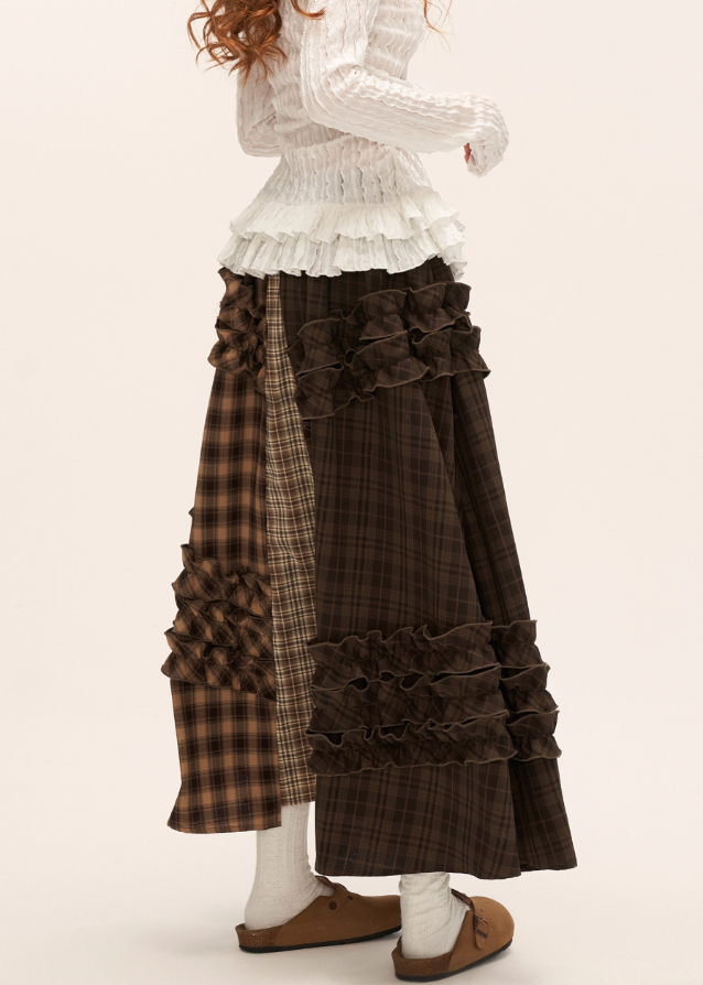 brown plaid skirt, layered midi skirt, patchwork check skirt, ruffle plaid skirt, autumn winter outfit women, mocha mid length skirt, fw25 collection, street boutique fashion, korean plaid fashion, tokyo style skirt
