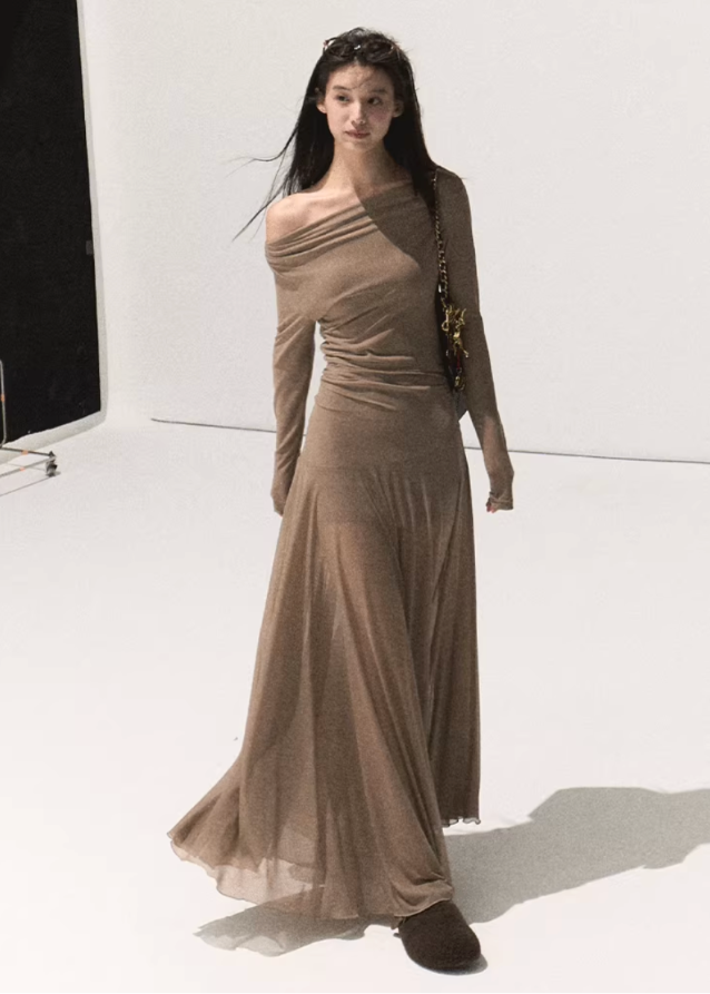 korean off shoulder long dress, minimalist chiffon long dress women, sheer mesh off shoulder gown, korean modern elegant long sleeve dress, soft beige off shoulder slim dress, seoul feminine sheer outfit, korean street fashion evening dress, high waist slim fit long dress, kfashion autumn soft mesh dress, korean aesthetic romantic gown, off shoulder elegant maxi dress, korean poetic minimalism fashion, flowy long dress seoul style, feminine waist wrap dress, neutral tone chiffon gown women