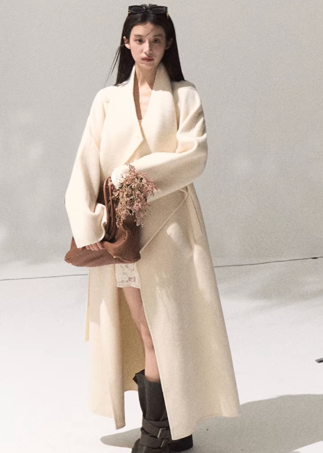 OAKMOO wool coat, long swing collar coat, full wool overcoat women, luxury winter jacket, belted wool wrap coat, minimalist draped coat, Korean fashion outerwear, OAKMOO AW collection, high-end wool trench, elegant long coat