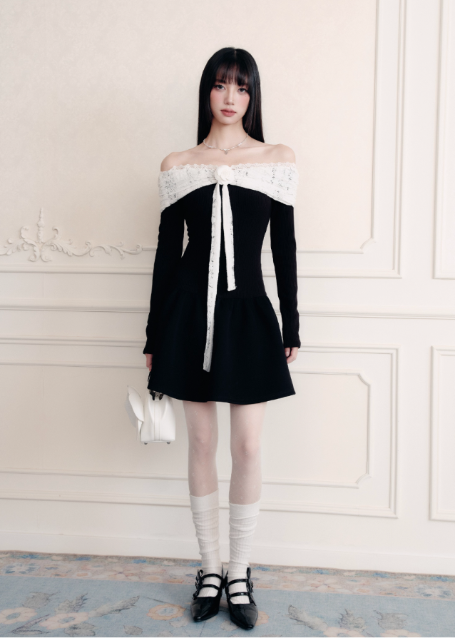 A declaration in silk and lace — the Confession Overture Dress embodies Fragileheart’s vision of refined rebellion. The sculpted off-shoulder neckline wraps delicately around the collarbone, accented by a lace ribbon rose that drapes like a whispered vow. Its cinched waist and flowing skirt create a timeless silhouette of grace, evoking the poise of a modern princess with quiet power.