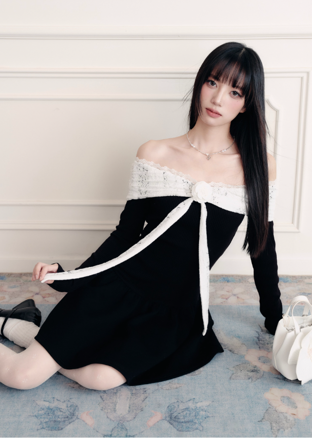 A declaration in silk and lace — the Confession Overture Dress embodies Fragileheart’s vision of refined rebellion. The sculpted off-shoulder neckline wraps delicately around the collarbone, accented by a lace ribbon rose that drapes like a whispered vow. Its cinched waist and flowing skirt create a timeless silhouette of grace, evoking the poise of a modern princess with quiet power.